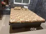 Box bed with side table