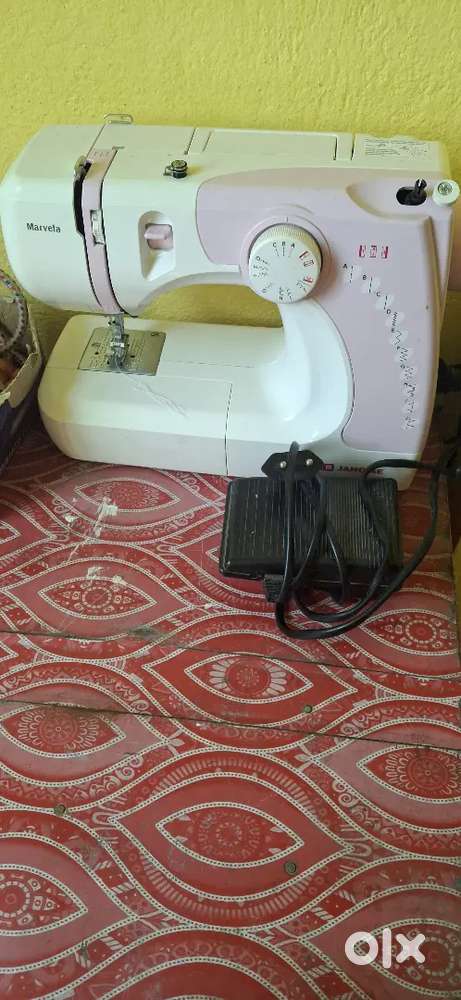 Usha electric sweeng mechine