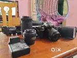 Nikon D5600 DSLR + 18-55mm kit + 35mm prime + 70-300mm + Flash