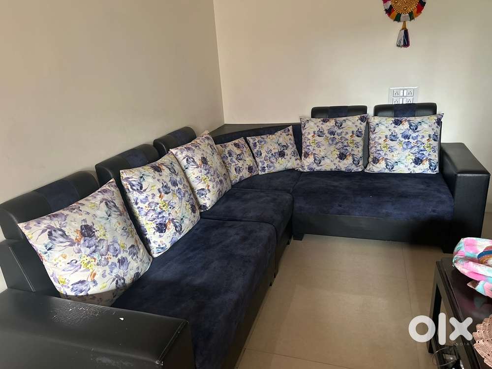 Six seater corner L shaped blue sofa