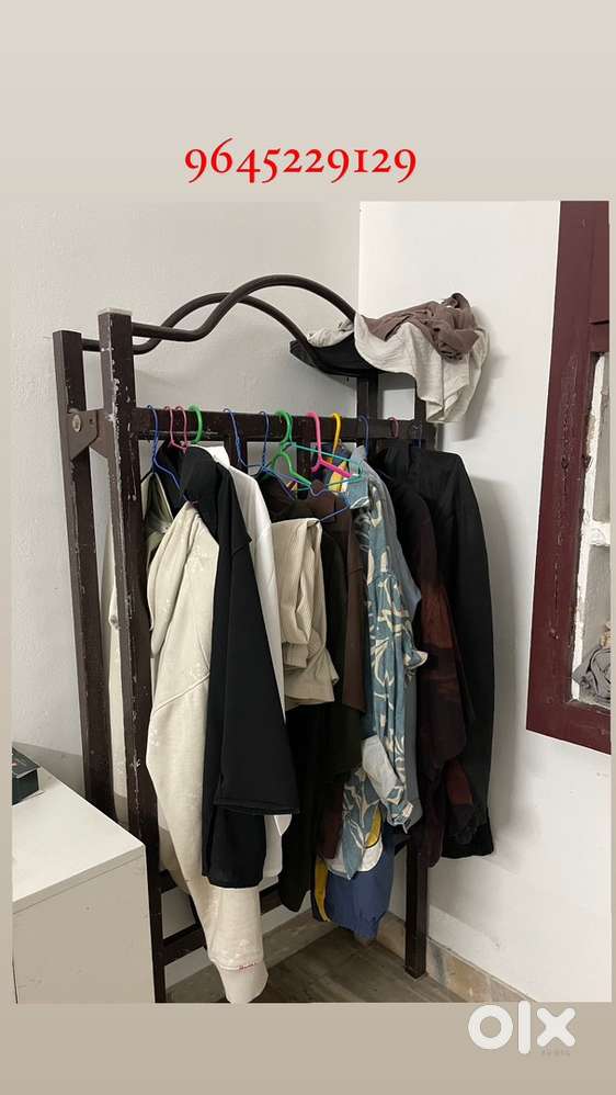 Dress hanging rail stand