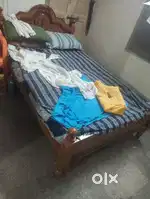 Kattil with bed wood
