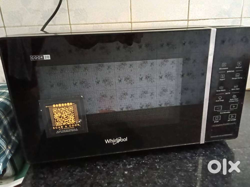 Whirlpool microwave oven good condition.