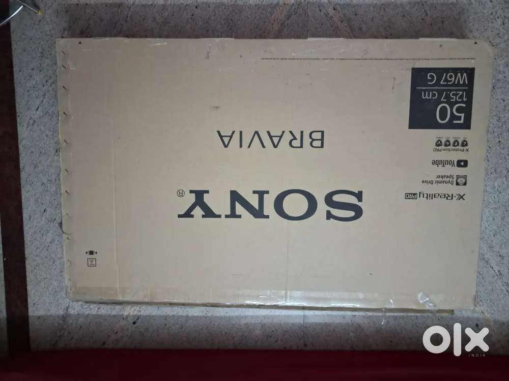 Sony TV 50  125.7 cm with sound bar and box