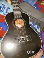 Ukulele black colour with bag
