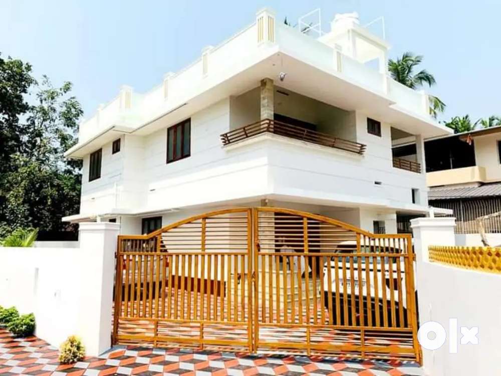 New house and plot in kannur. urgent sale