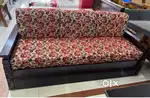 Sofa cum bed with storage unit