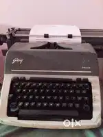 Typewriter English and malayalam goderej mechin  for sale or rent
