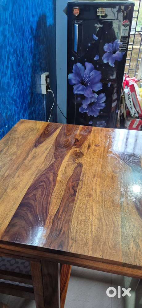 4 seater wooden dining table