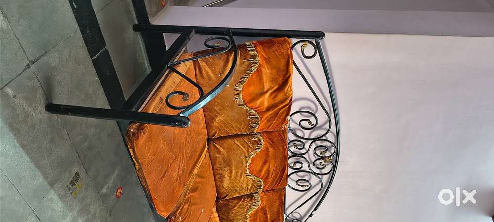 5 years old & frame is made of iron.