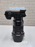 Used sony alpha a6400 4k camera Sony fe 18-105mm f4 PZ lens full kit.