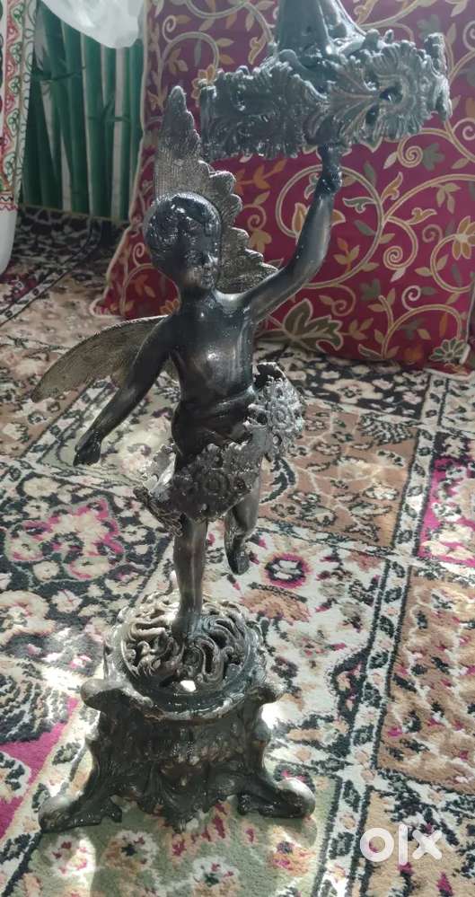 Antique cast metal statuettee