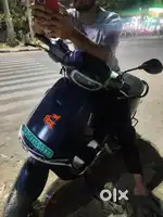 Well condition, single hand use scooter.