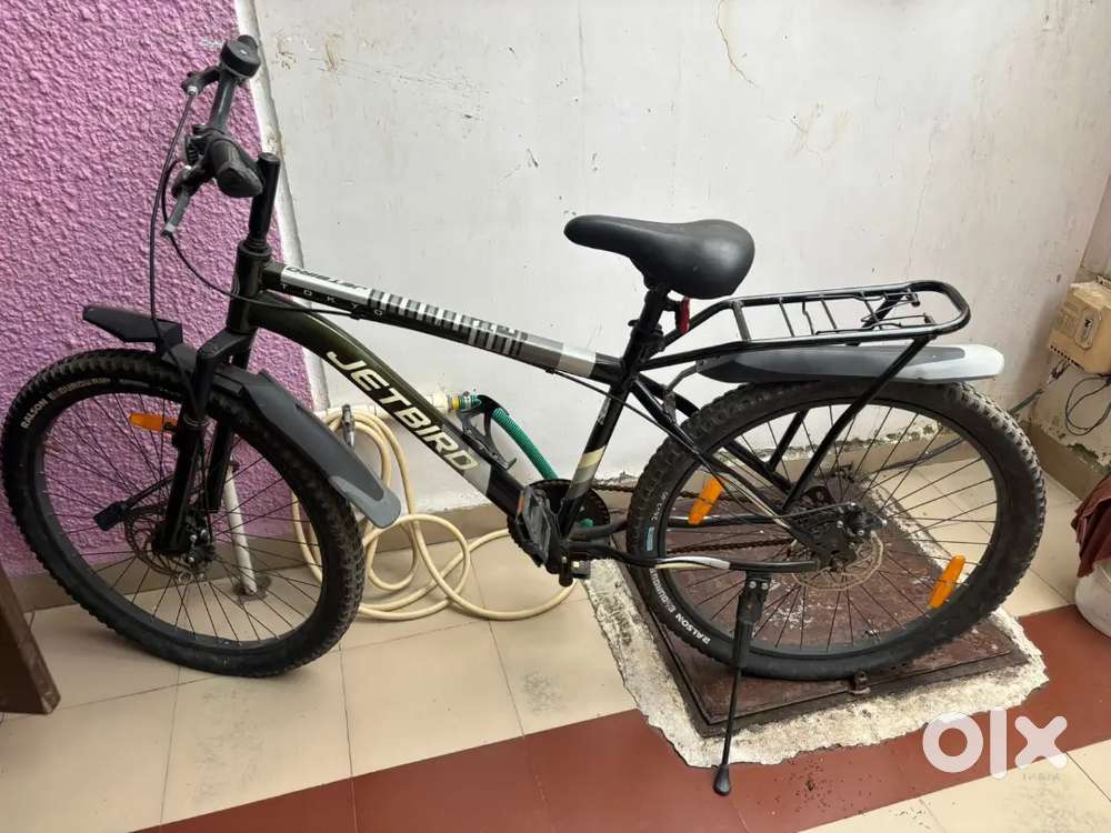 Black bicycle with back seat