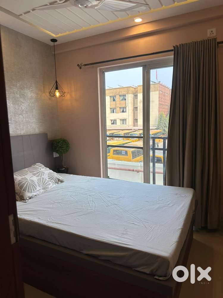 Furnished room /PG with Balcony near Eco Space /TCS Safe family home 1