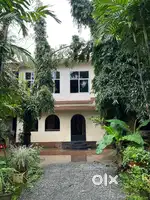 House, plot of 21.5 cent and 3 shops for sale