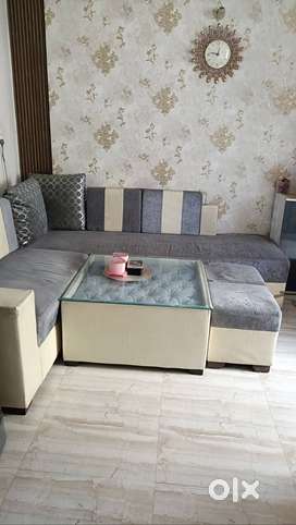 5 seater L shape sofa +  2 puffies + center table