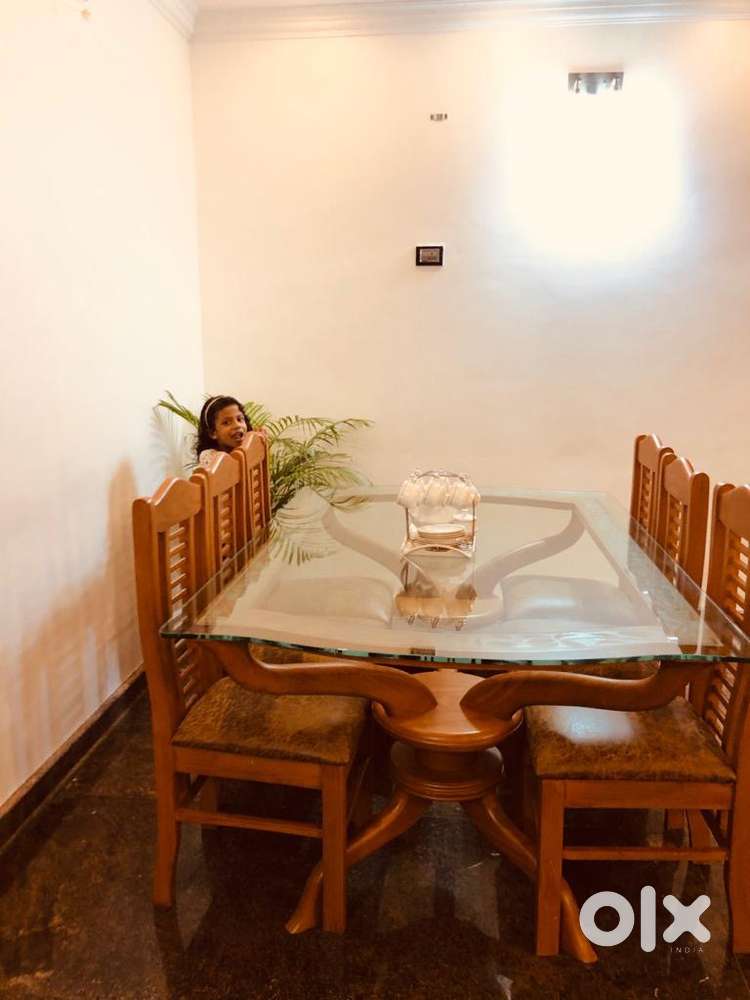 Brown wooden dining table