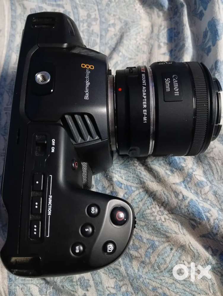 Blackmagic Cinema Camera 4K with mount adapter and canon 50mm lens