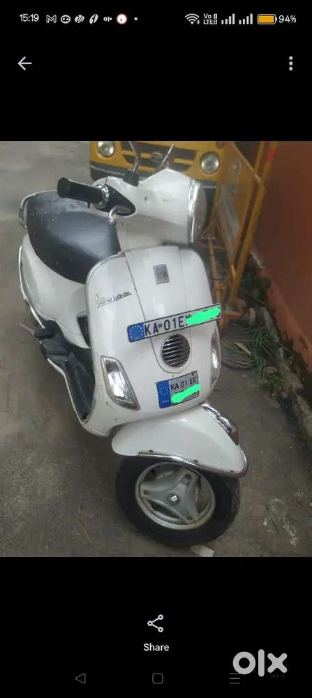 Two wheeler white for sale. Activa and vespa