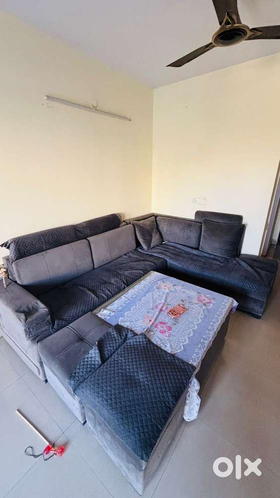 Modern 7-Seater Sofa with Ottomans & Glass Table – ₹13,000