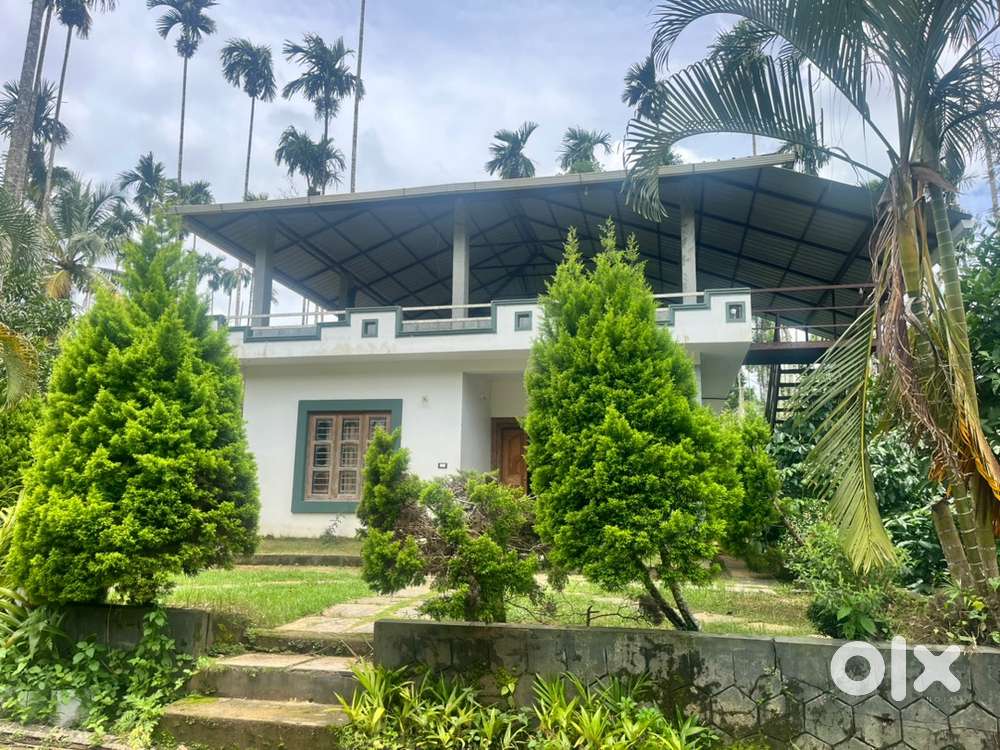 Wayanad banasura dam near 10 acre with house selling river frontage
