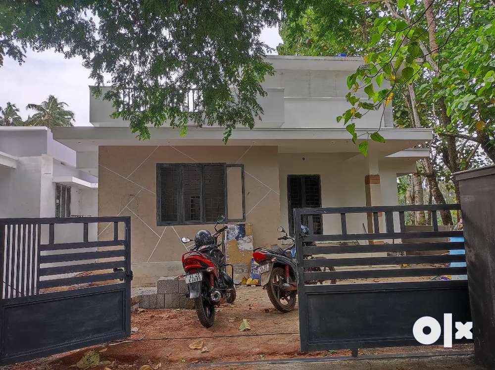 AN AMAZING NEW 2BED ROOM 1200 SQ FT 5CENT HOUSE IN ADATTU,THRISSUR