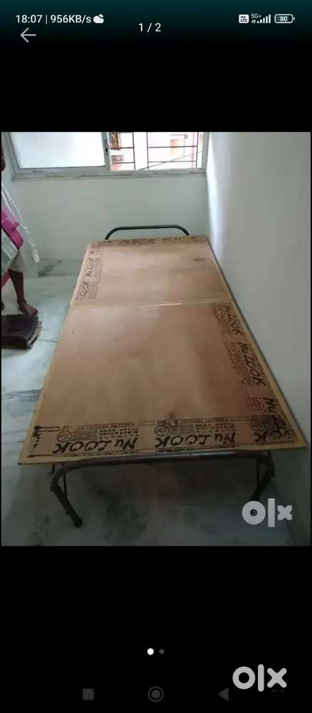 Folding Steel frame Wooden Cot.