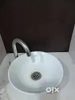 Hand wash basin with steel tap