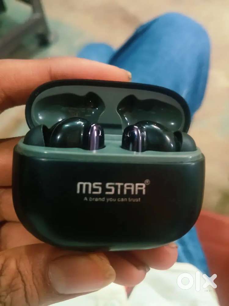 Ms Star Air buds with their box and cable