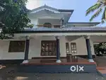 12.5 cent plot with house for sale near railway station changanassery