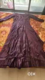 2 Expemsive Gowns xl. Used once only.