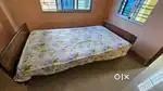 wooden single bed
