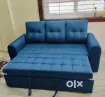3 seater sofa comebed with attached pillow and designing handle