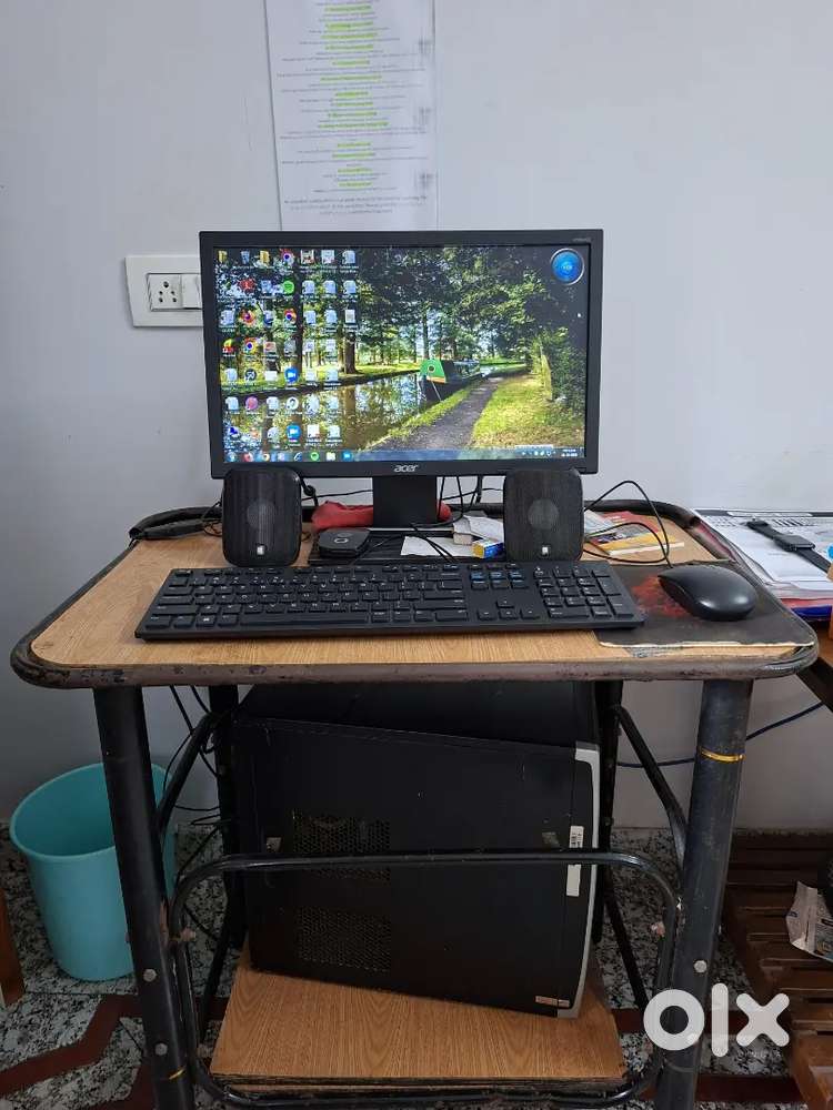 HCL CPU,MONITOR,  KEY BOARD, SPEAKERS WITH TABLE