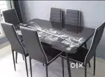 Painted Glass dining table for sell with 6 chairs