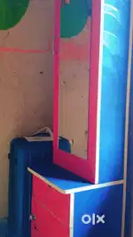 A blue and red themed mirror