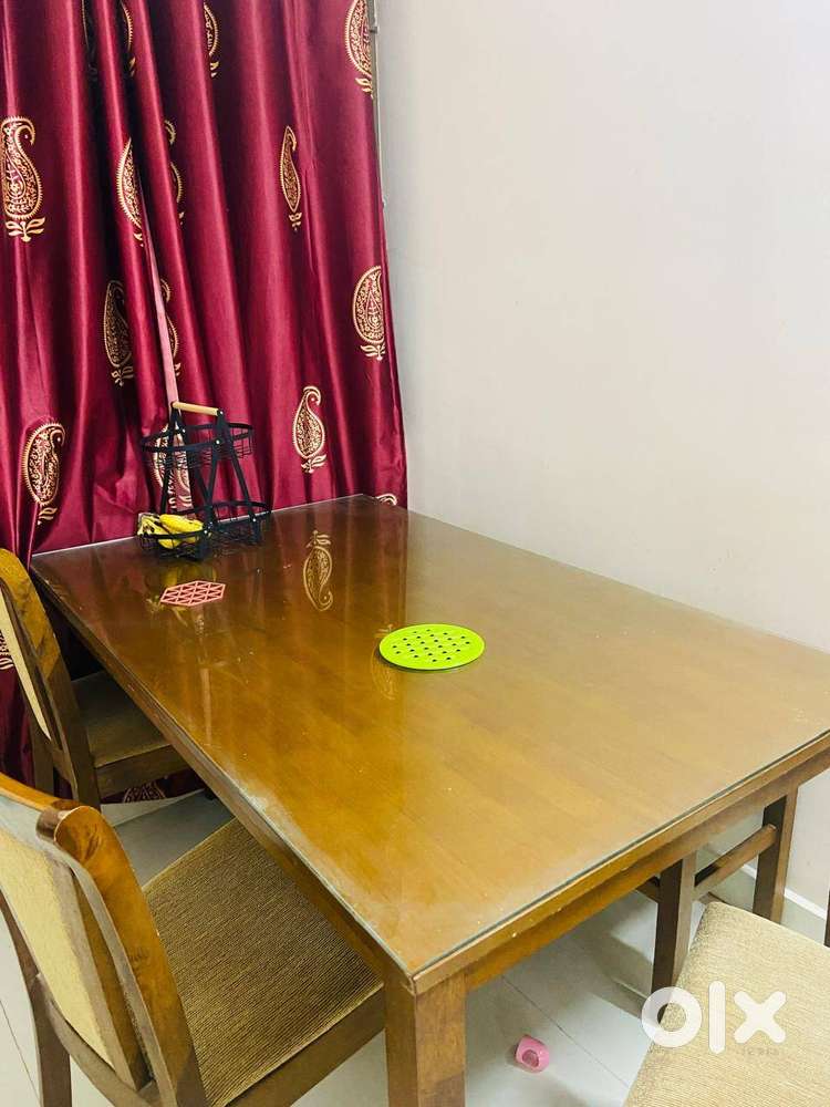 6 seater Nilkamal wooden dining table for sale