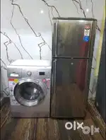 Samsung latest double door refrigerator and ifb front load washing mac
