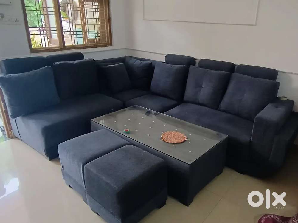 L shaped Sofa set with table and two stool