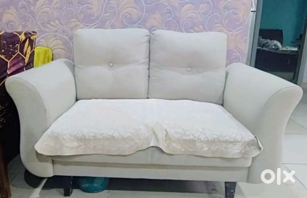 Stylish Comfort: Beige Tufted Sofa for Sale