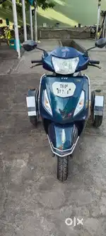 TVS JUPITER ALONG WITH SUPPORTING WHEELS