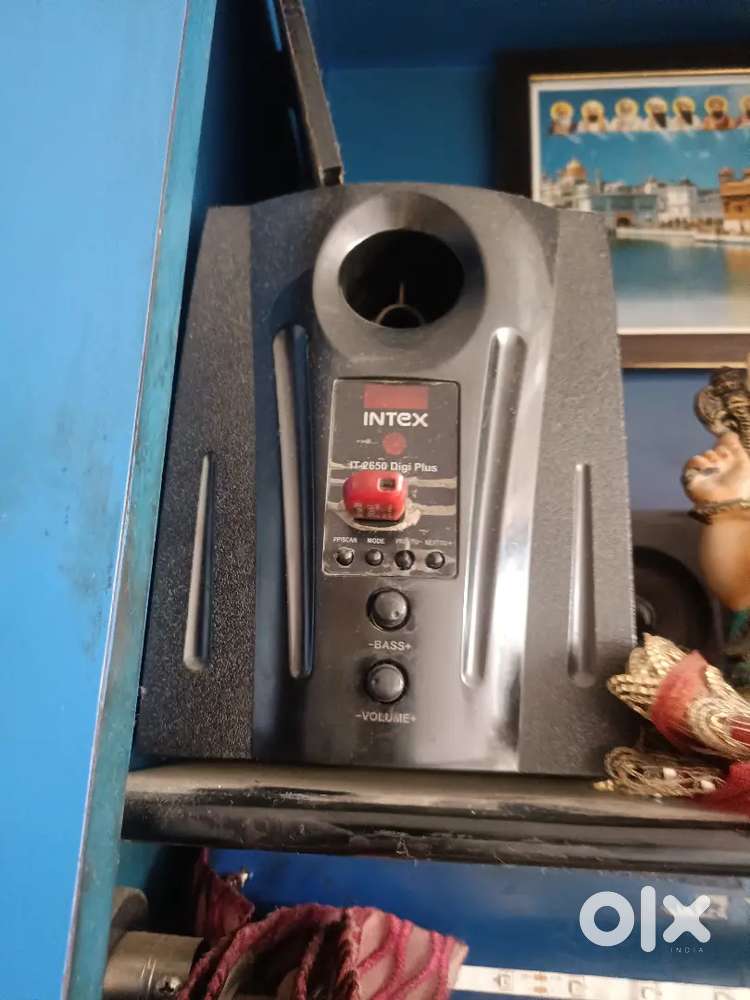 One looking new brand music system with 4 Small Speakers