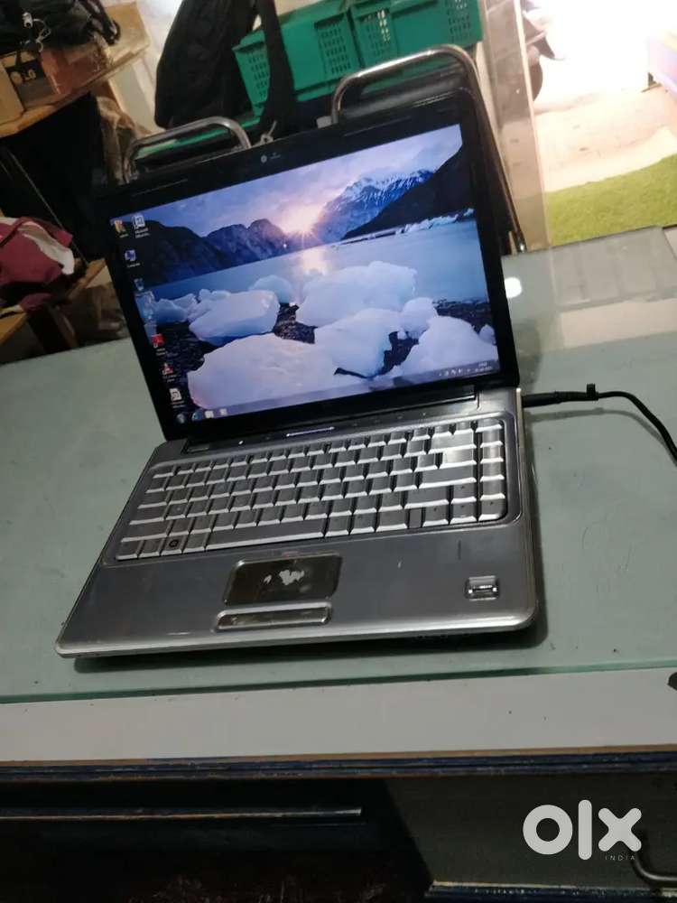 Hp laptop + pentium R + 2GB RAM + 160GB HDD + with Windows 7