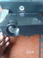 UNIC wifi Projector, good condition and new.