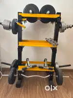 Dumbbell and barbell with weights and metal rack