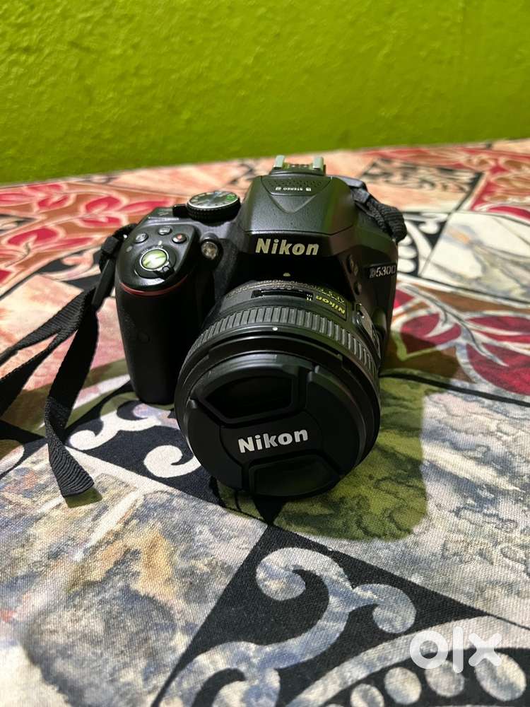 NIKON D5300 with 18-55 kit lens with 50mm
