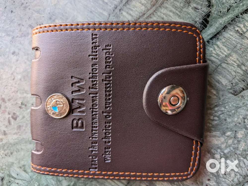 Brown leather wallet .