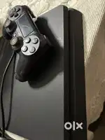 PS4 slim 500gb with 4 games cd like GTA 5 , FIFA 21, WWE2k23, LOU