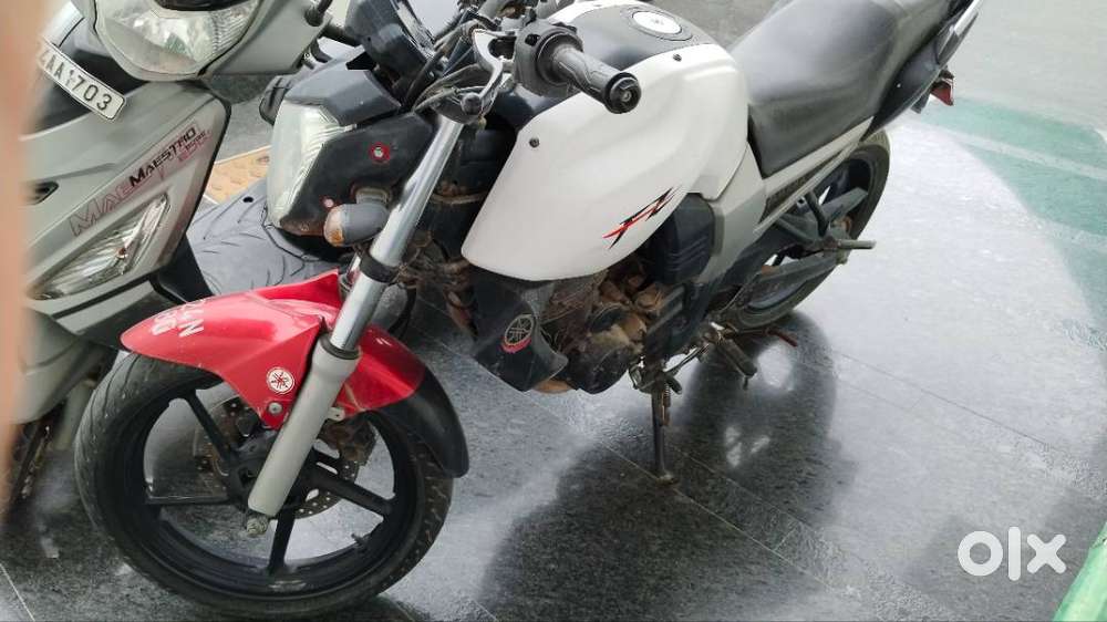 RED & Black colour .. Wrapped in White now